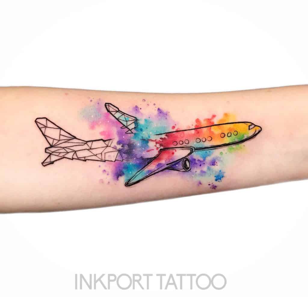 Minimalistic style airplane and heart tattoo located on